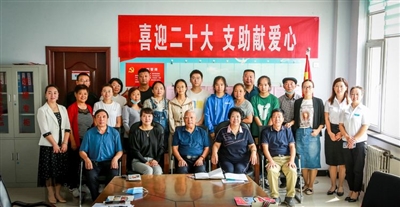 区创业就业促进会为贫困生大学生献爱心